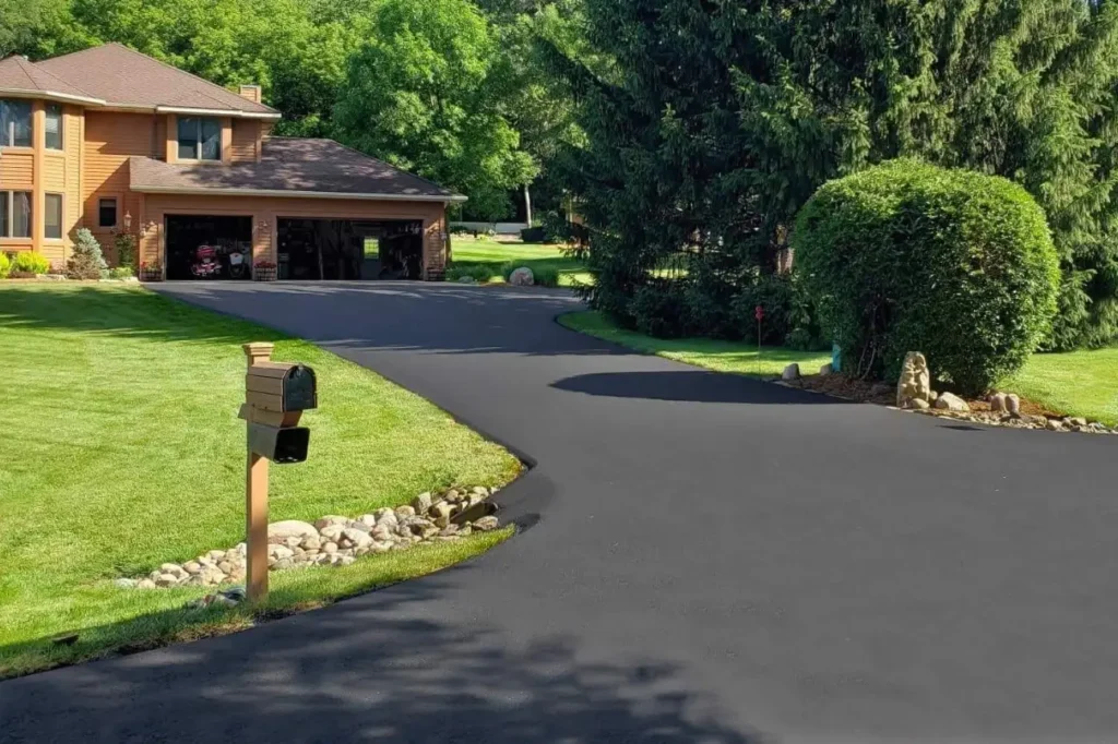 Curved residential Driveways completed by Asphalt Contractors Auckland highlighting expert Driveways installation and repair in Auckland.