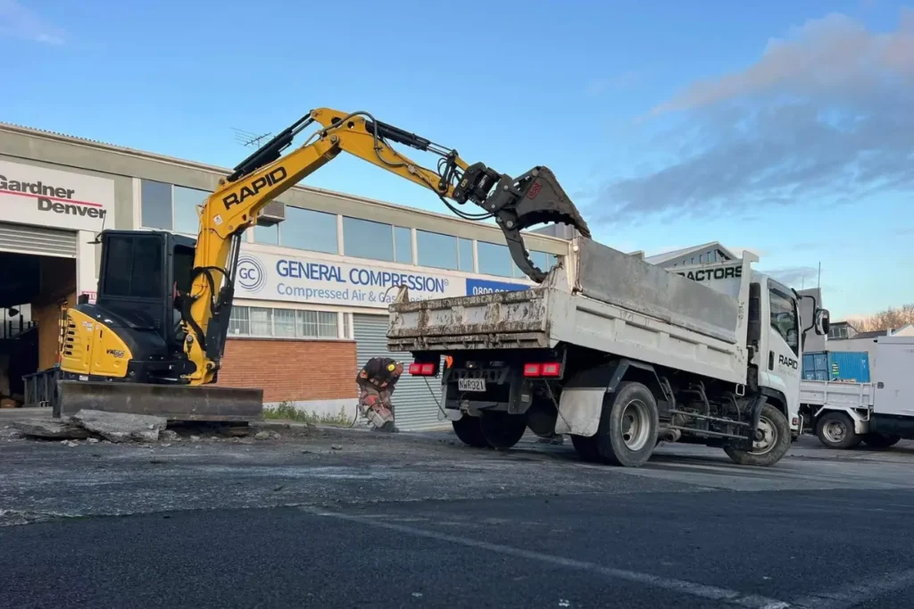 Why Choose A Team Focused On Reliable Asphalt Solutions by Asphalt Contractors Auckland featuring professional excavation and asphalt removal with modern equipment.