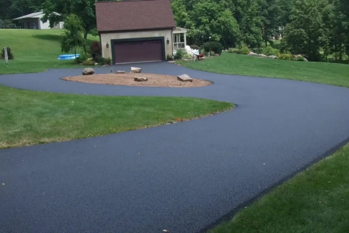 Service That Puts Your Property First by Asphalt Contractors Auckland featuring a professionally paved residential driveway designed for durability and curb appeal.